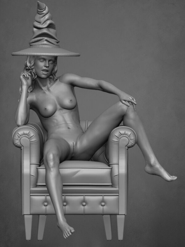 HERMIONE SUR LE FAUTEUIL EN CUIR AVEC LE CHAPEAU DE TRIAGE MAGIQUE-00002 HERMIONE SUR LE FAUTEUIL 01