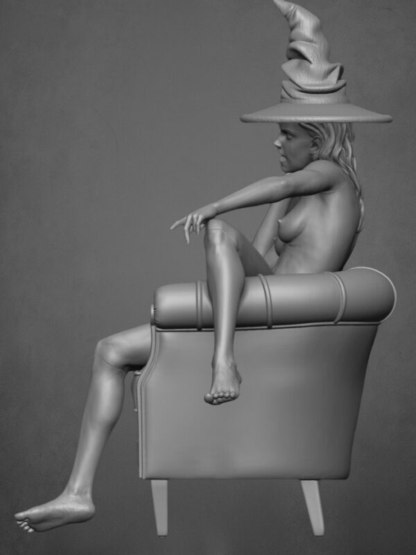 HERMIONE SUR LE FAUTEUIL EN CUIR AVEC LE CHAPEAU DE TRIAGE MAGIQUE-00003 HERMIONE SUR LE FAUTEUIL 01